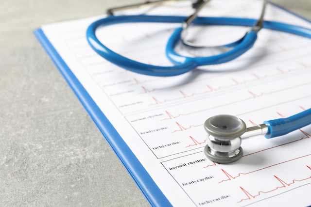 stethoscope sitting on medical notes to represent the outcome of the amos report for families