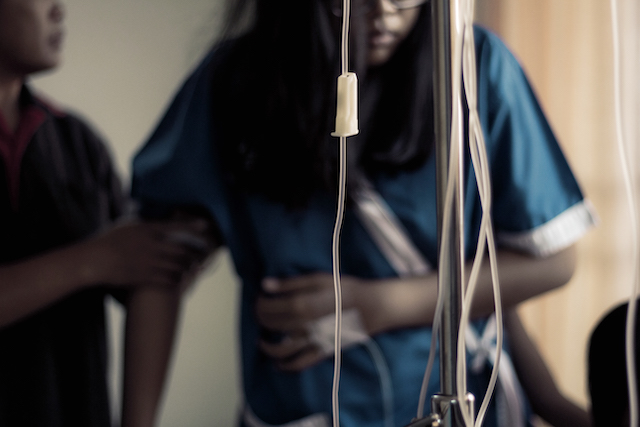 pregnant woman with iv drip in blog about marthas rule during the nuh maternity scandal