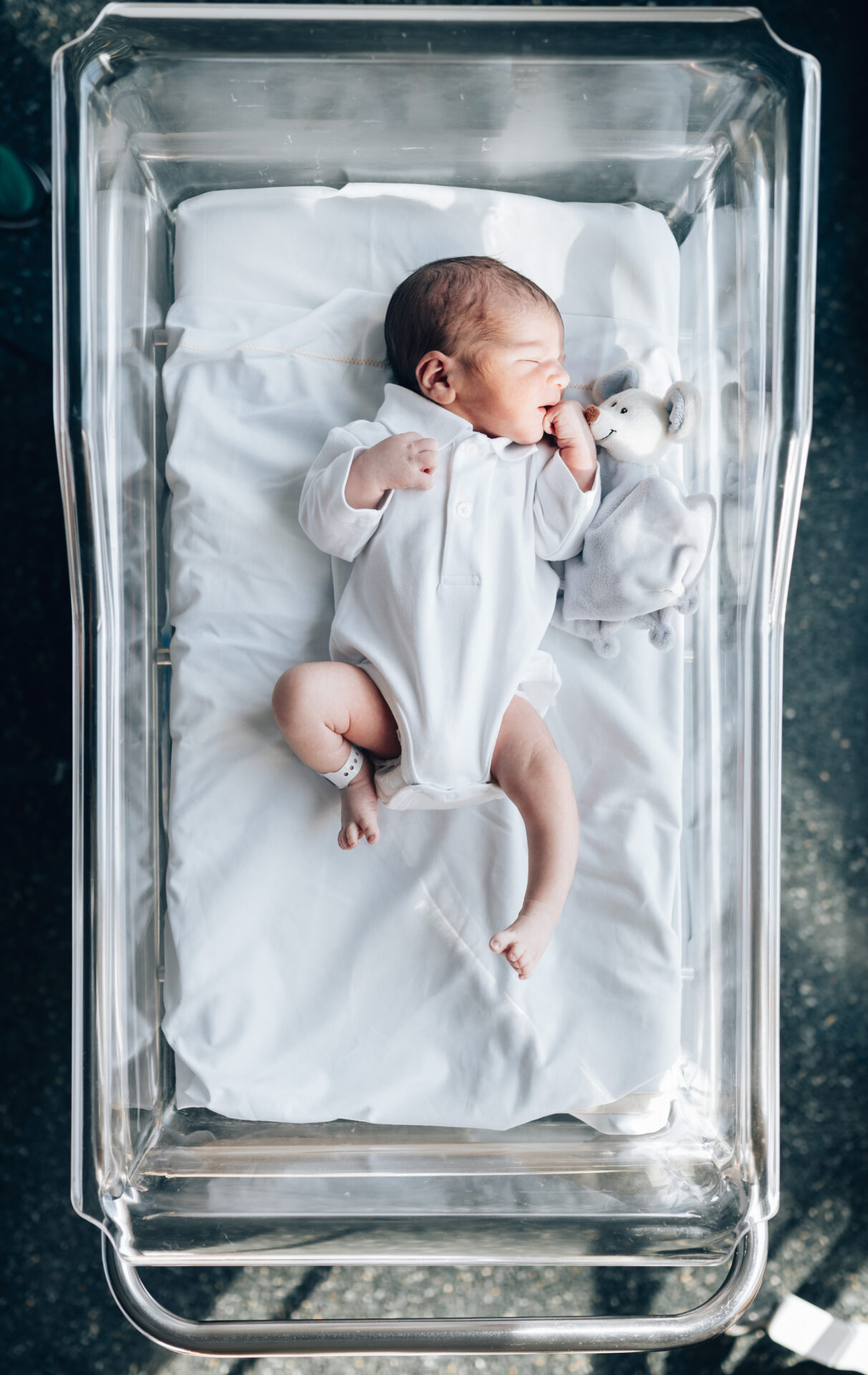 baby in a cot, helped by Medical Negligence Solicitors Leeds